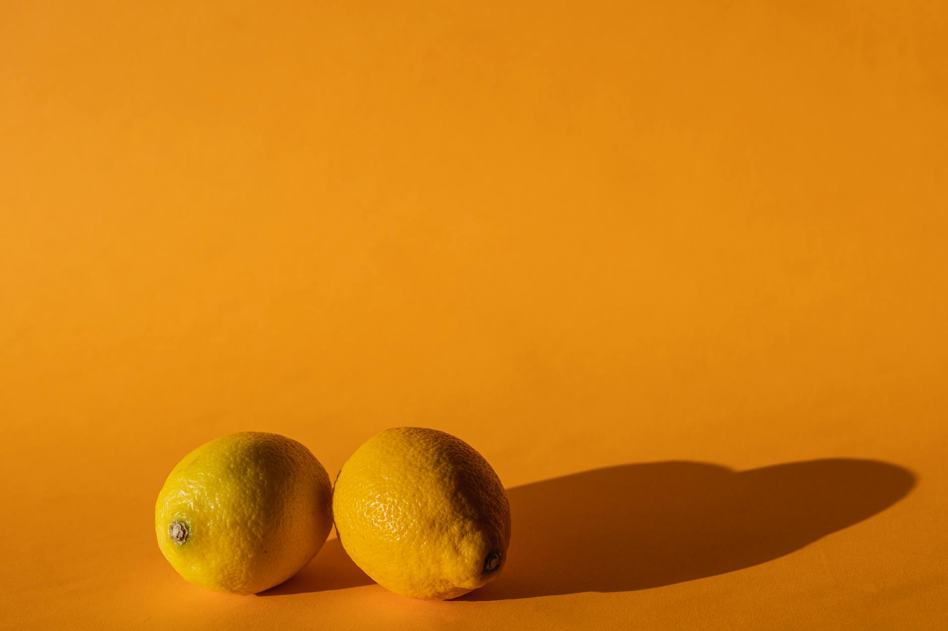 Bright yellow lemons symbolizing fresh starts and gentle pleasure recovery